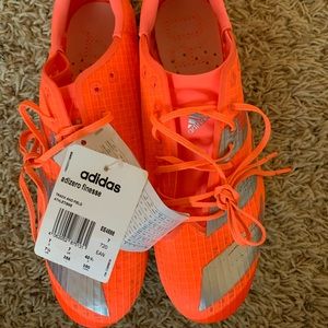 Adizero finesse training spikes orange and silver